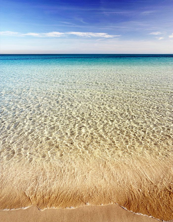 Beaches of fine white sand on Red Island in Sardinia